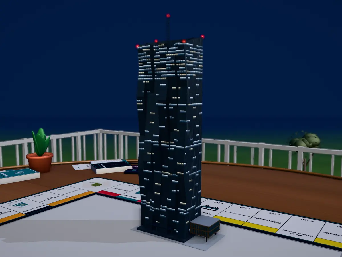 Der DC Tower bei Nacht mit beleuchteten Büros